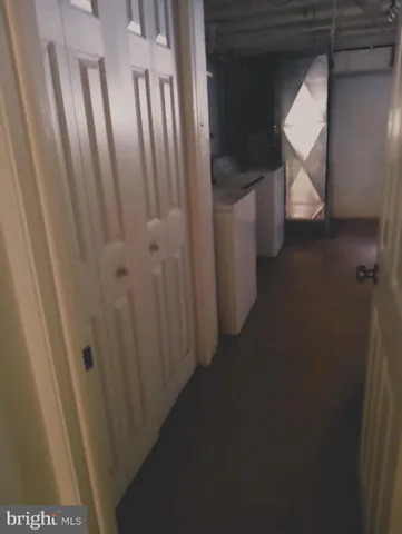 a utility room with a sink dryer and washer