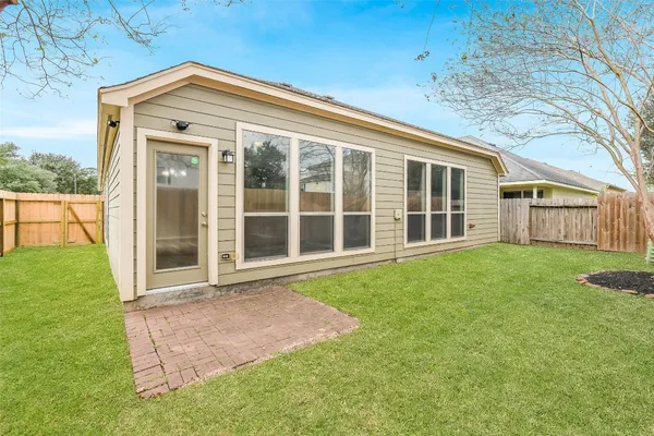 a view of a house with a garden