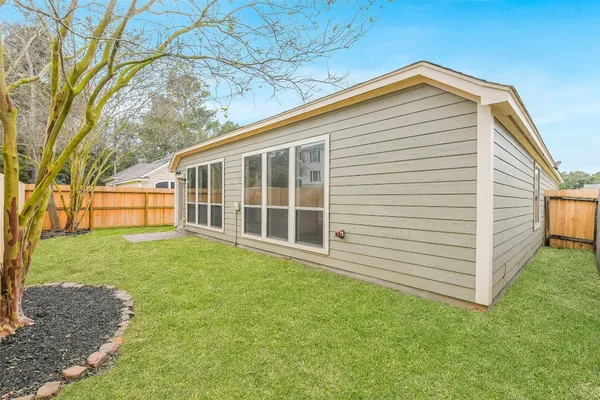 a view of a backyard with a garden