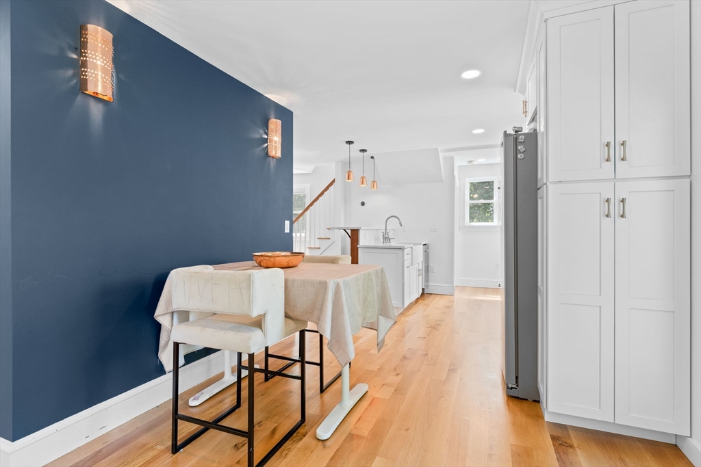 342 Franklin Street, Unit ST Framingham, MA 01702 - Photo 13 of 39 a view of a workspace with furniture and wooden floor