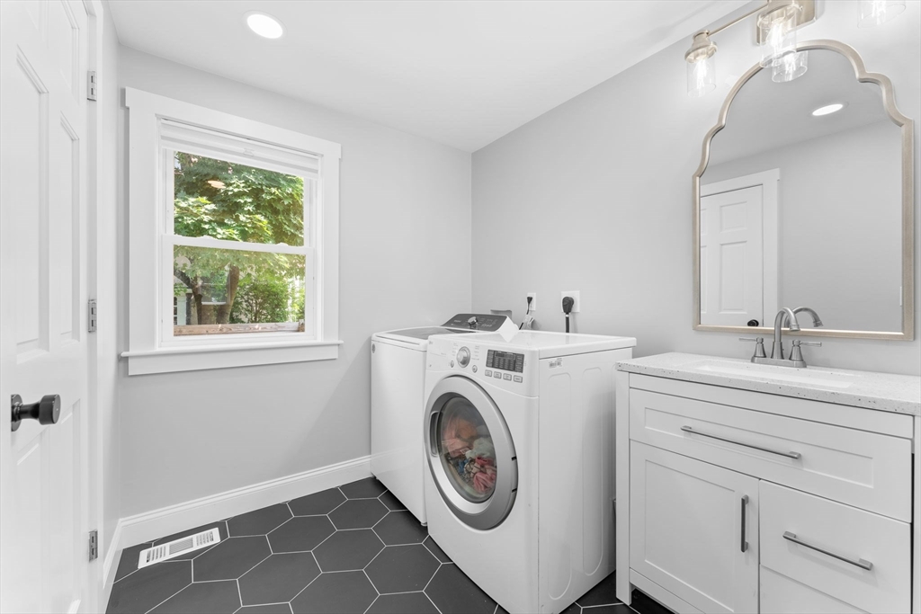 342 Franklin Street, Unit ST Framingham, MA 01702 - Photo 15 of 39 a utility room with dryer and washer