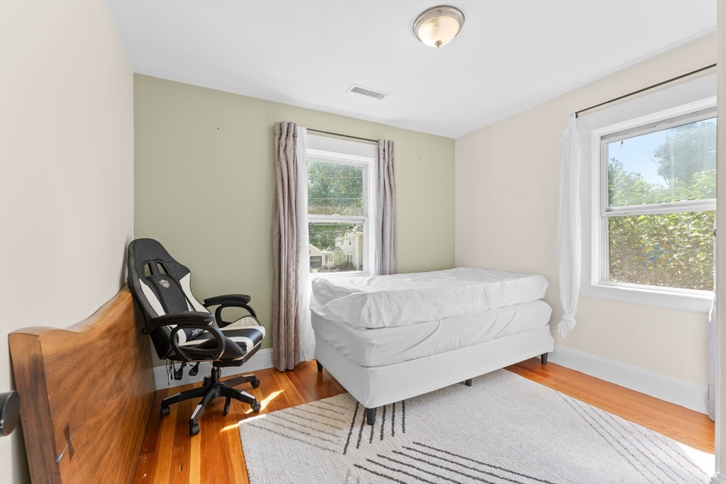 342 Franklin Street, Unit ST Framingham, MA 01702 - Photo 19 of 39 a bedroom with a bed and a window