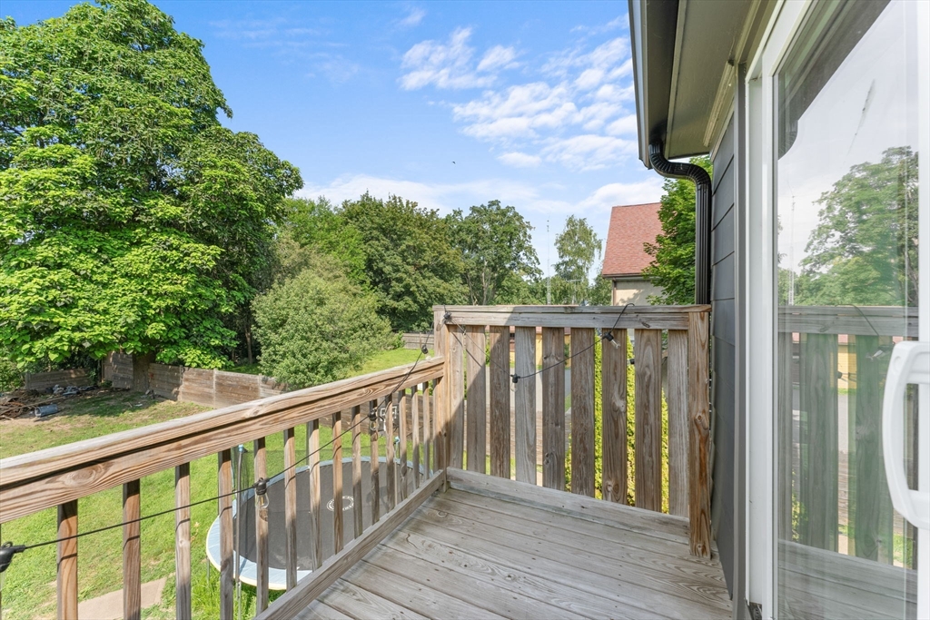 342 Franklin Street, Unit ST Framingham, MA 01702 - Photo 25 of 39 a view of a wooden fence