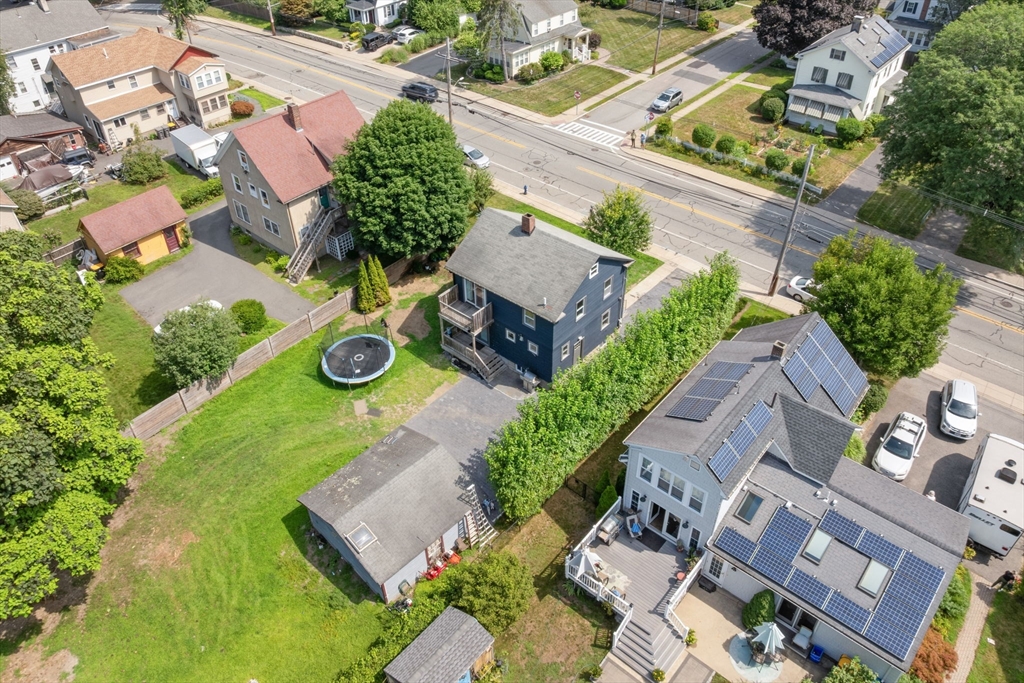 342 Franklin Street, Unit ST Framingham, MA 01702 - Photo 35 of 39 an aerial view of a house with garden space and street view