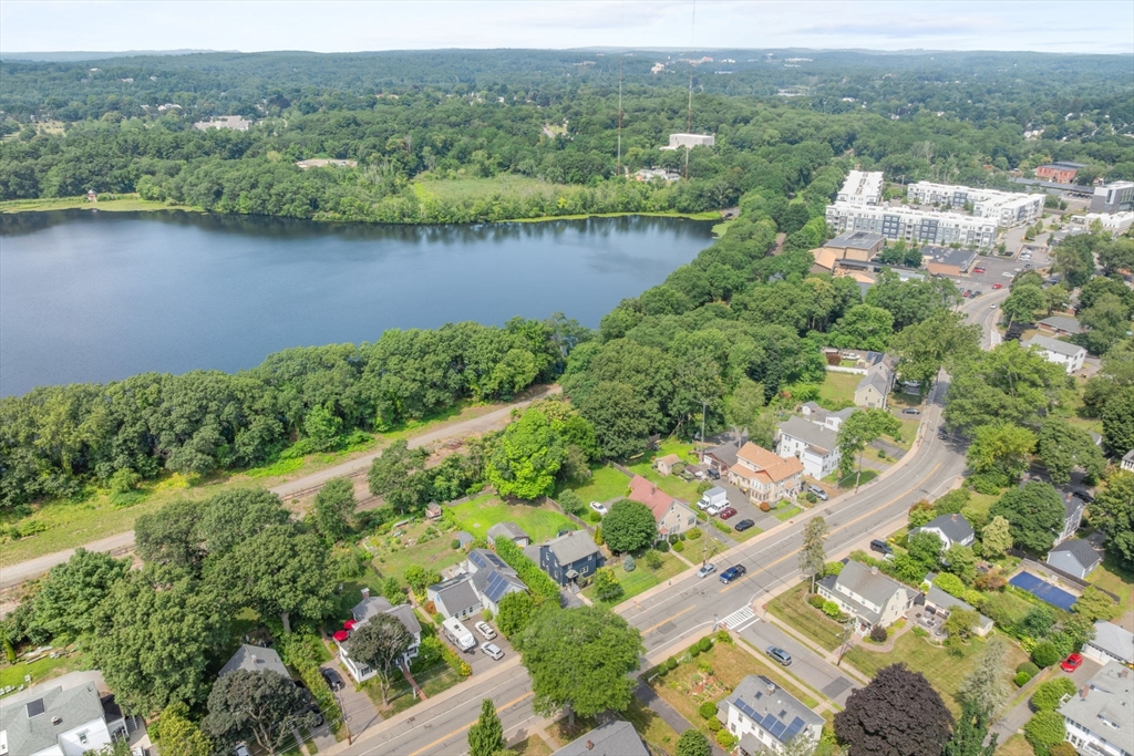 342 Franklin Street, Unit ST Framingham, MA 01702 - Photo 37 of 39 an aerial view of a house with a yard and lake view