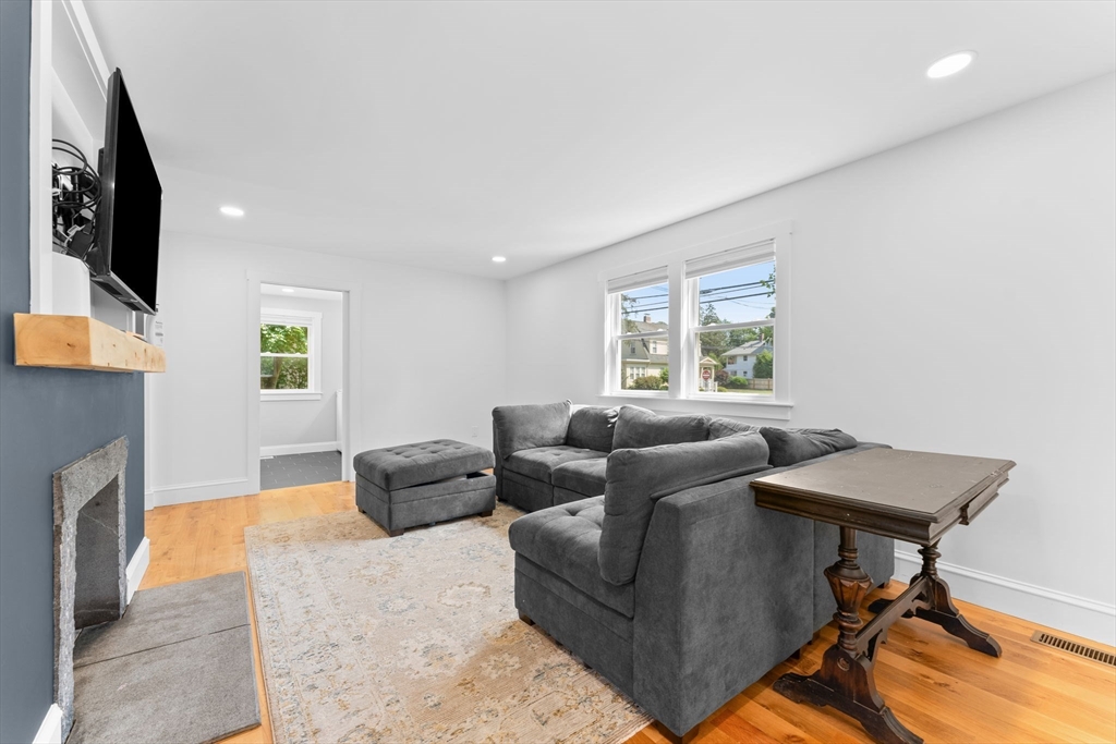 342 Franklin Street, Unit ST Framingham, MA 01702 - Photo 6 of 39 a living room with furniture and a window