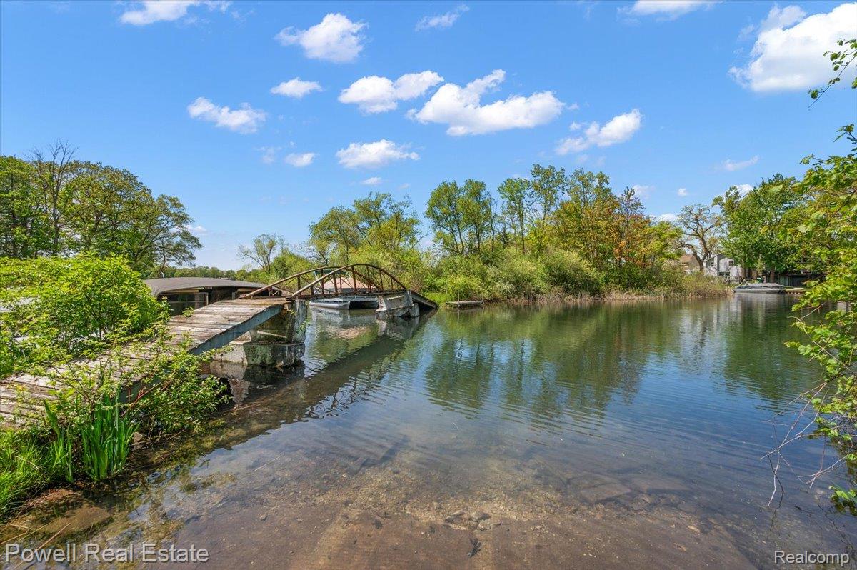 6837 Hatchery Road Waterford, MI 48327 - Photo 15 of 56 Water view featuring a dock