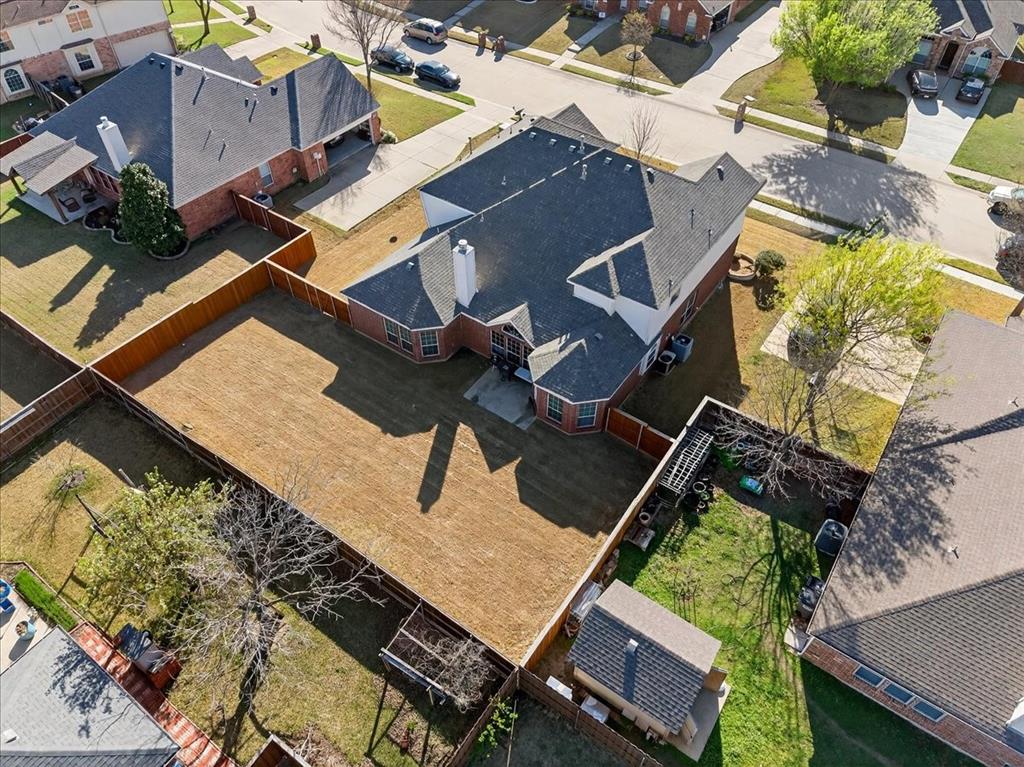 7308 Hawk Lane Sachse, TX 75048 - Photo 35 of 37 an aerial view of houses with yard
