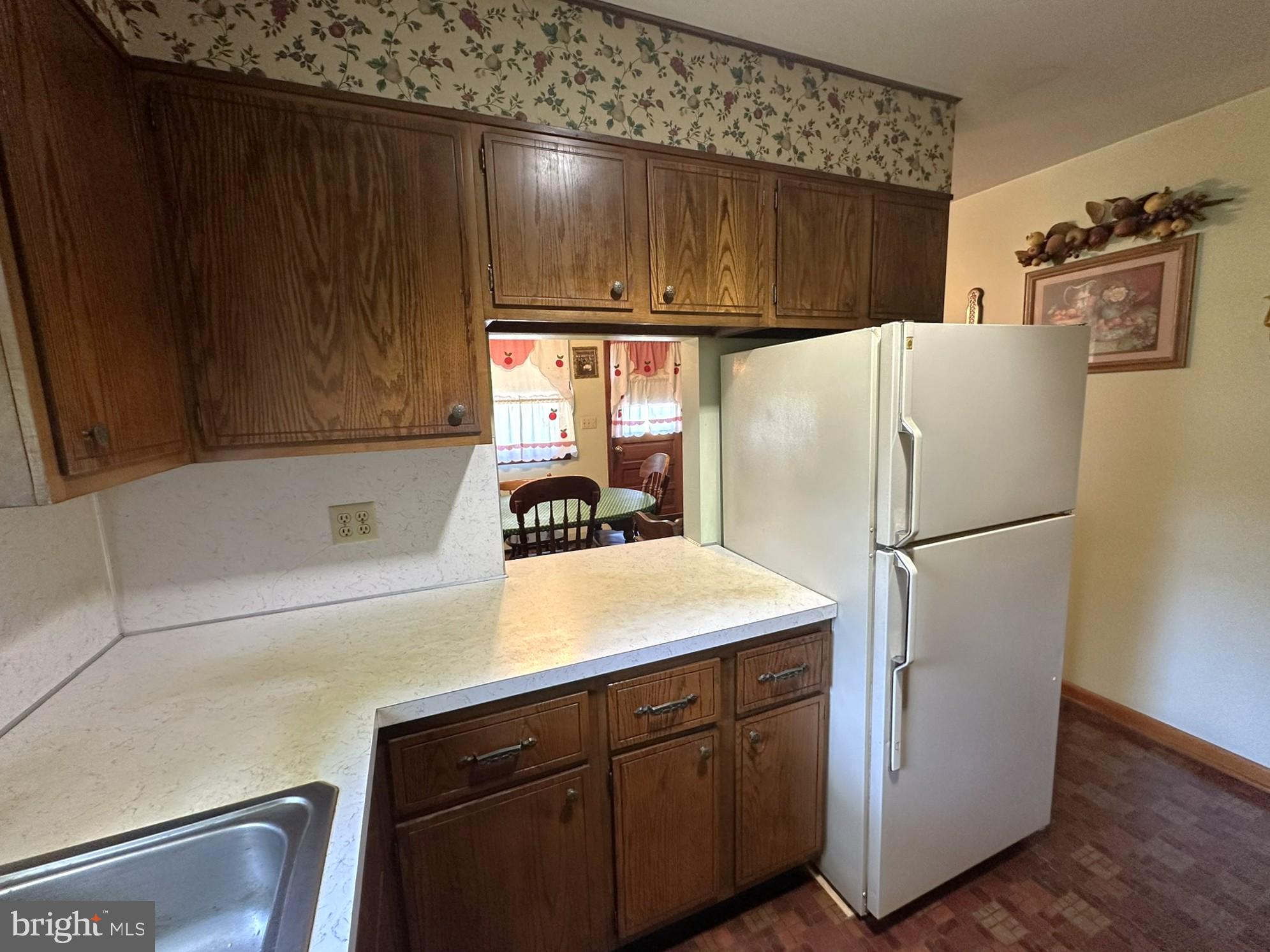 1222 Hoff Road Hanover, PA 17331 - Photo 11 of 37 a white refrigerator freezer sitting inside of a kitchen