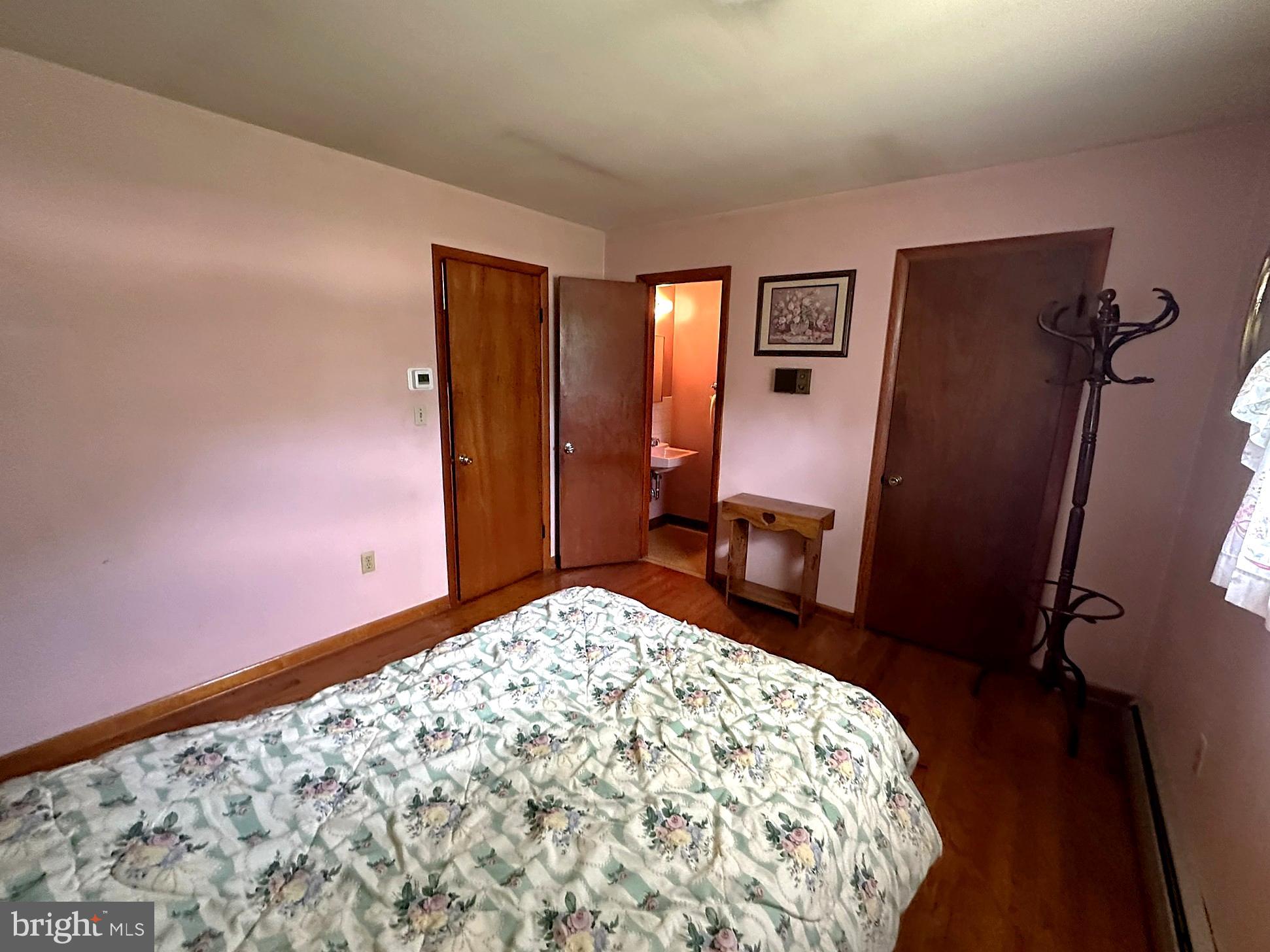 1222 Hoff Road Hanover, PA 17331 - Photo 17 of 37 a bedroom with a bed and a dresser