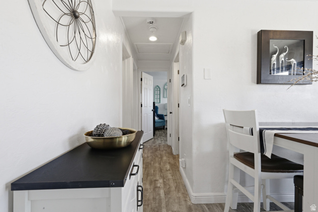 830 North Stone Road Snowville, UT 84336 - Photo 9 of 69 Hallway featuring light wood-type flooring and baseboards