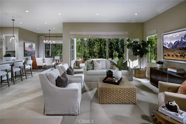 a living room with fireplace furniture and a flat screen tv