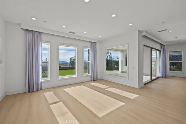 a bathroom with a sink toilet and a mirror