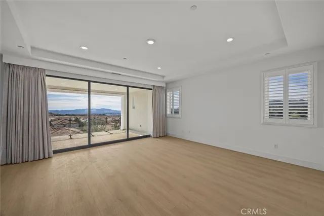 a bathroom with a sink vanity and mirror