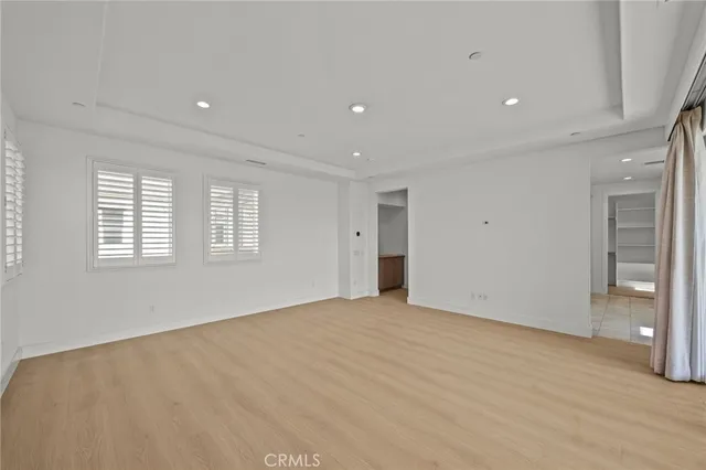 a bathroom with a tub a sink and a shower