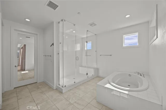 a bathroom with a sink toilet tub and vanity
