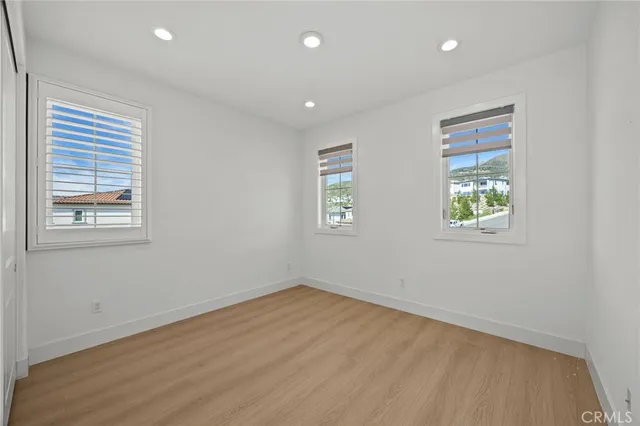 a view of a house with a yard and furniture