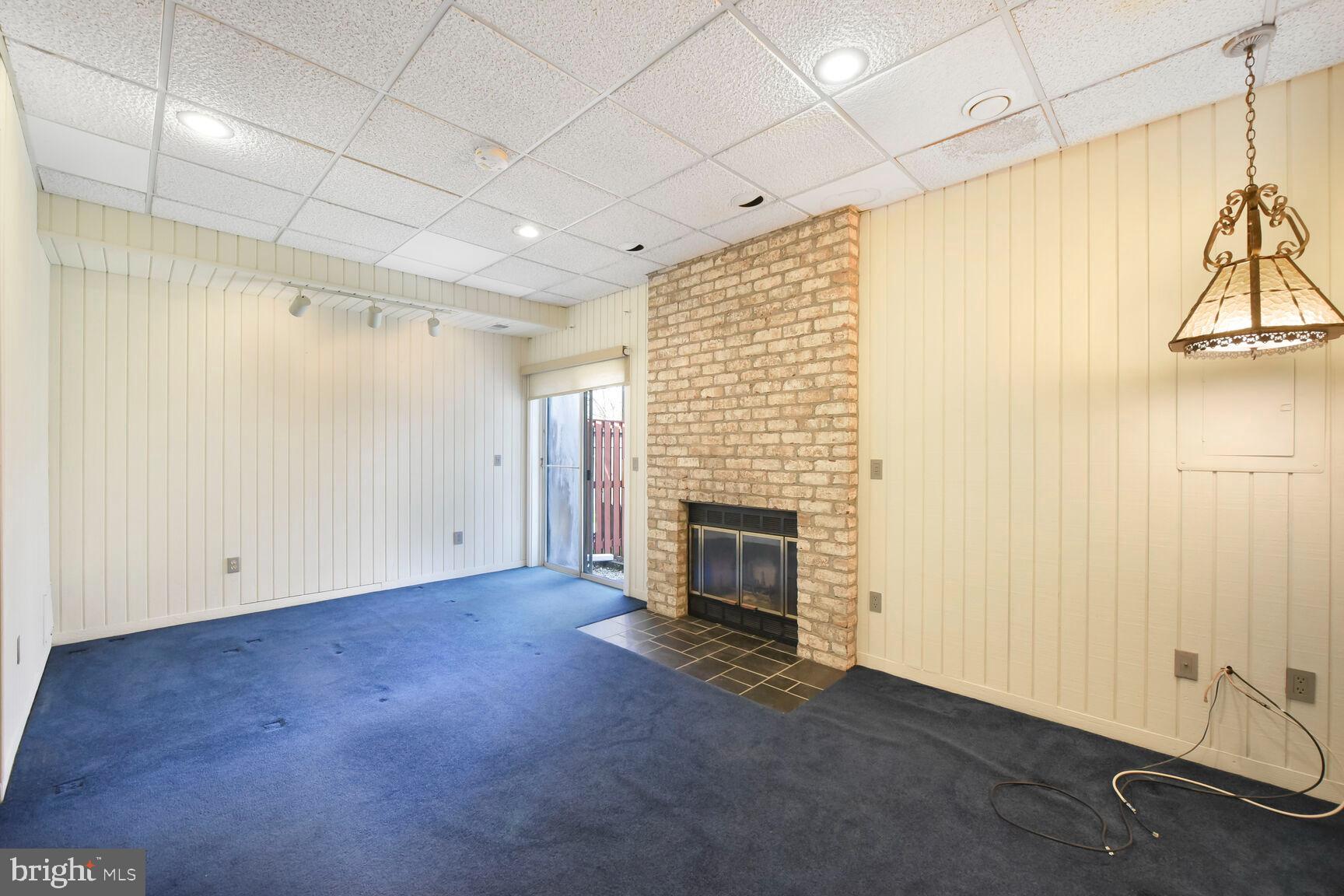 13417 Elevation Lane Herndon, VA 20171 - Photo 13 of 30 a view of empty room with fireplace