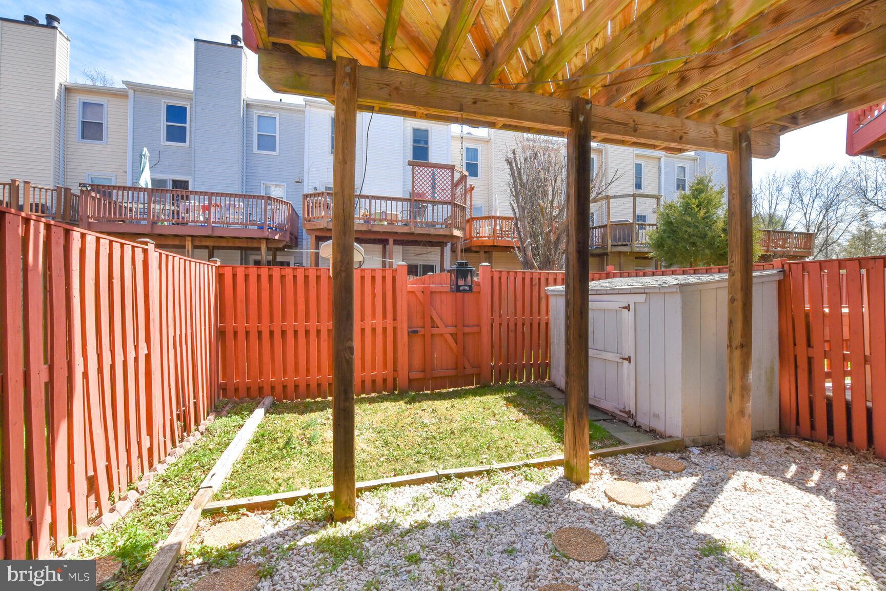 13417 Elevation Lane Herndon, VA 20171 - Photo 24 of 30 a view of backyard with patio