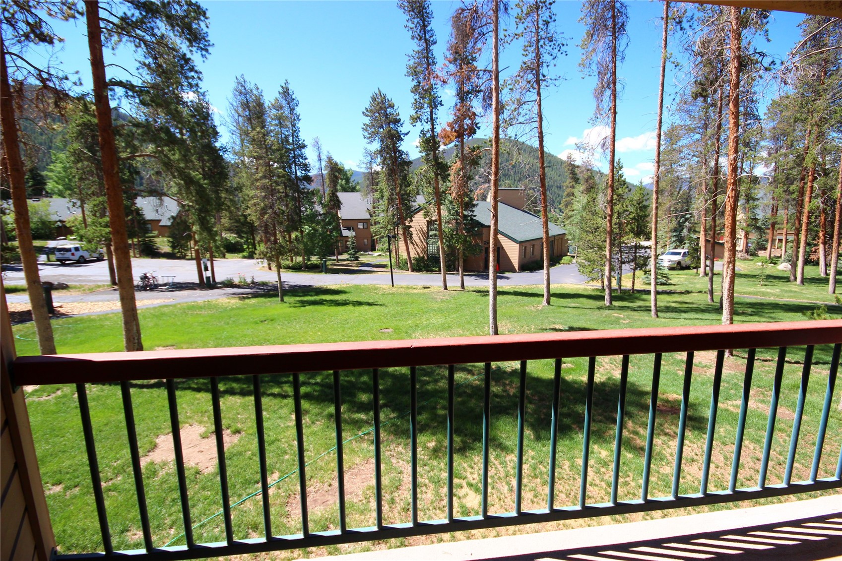View of yard with a balcony
