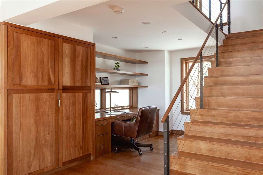 154 Argilla Road Ipswich, MA 01938 - Photo 18 of 42 a view of entryway with wooden floor and stairs