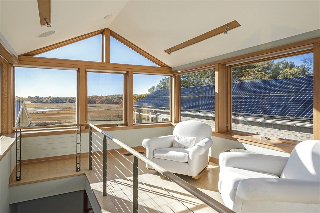 154 Argilla Road Ipswich, MA 01938 - Photo 20 of 42 a living room with furniture and a large window