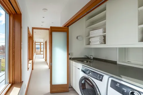 a bedroom with a bed and a cabinets