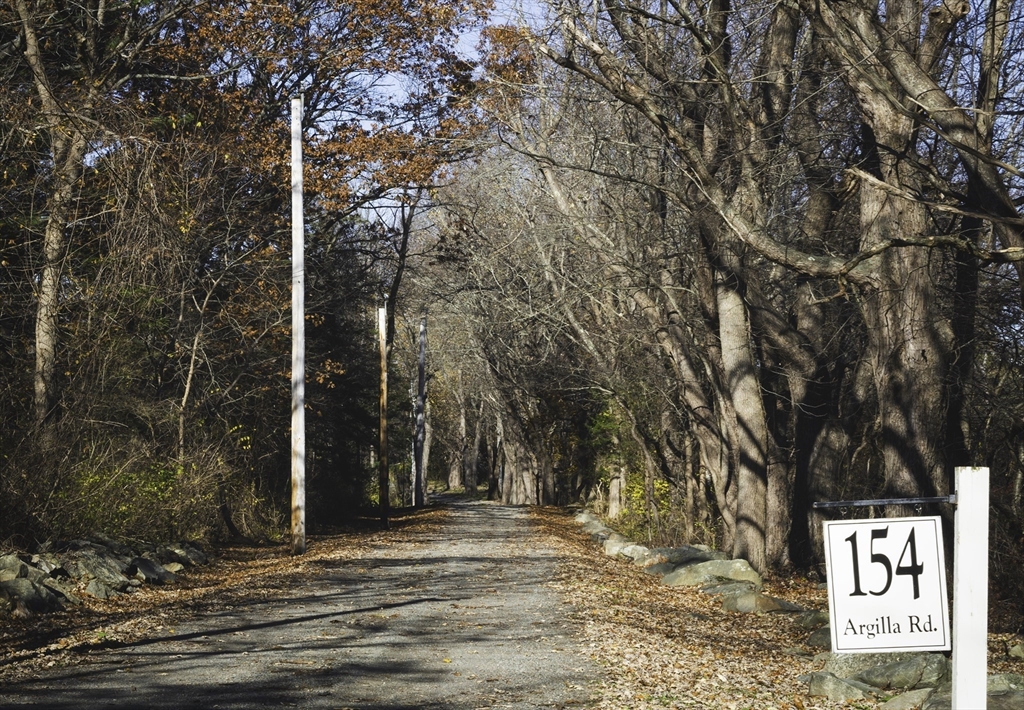 154 Argilla Road Ipswich, MA 01938 - Photo 3 of 42 a view of street along with trees