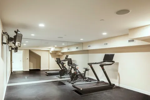 a view of sitting area with furniture and wooden deck