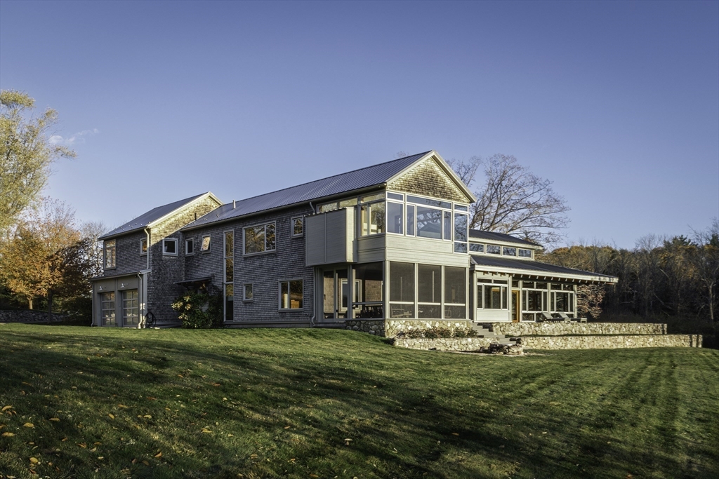 154 Argilla Road Ipswich, MA 01938 - Photo 38 of 42 a front view of a house with a yard