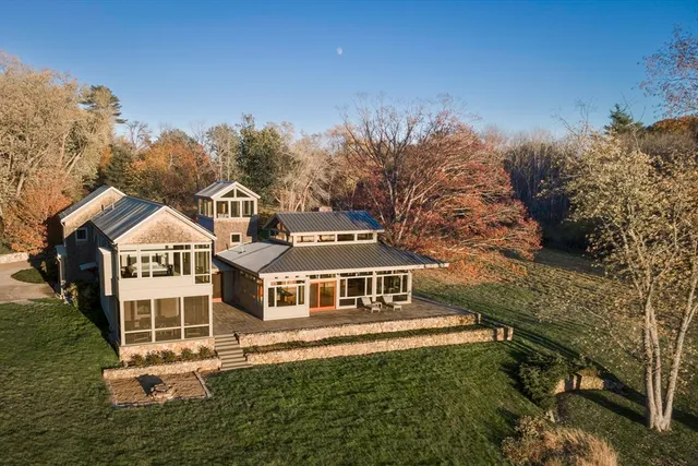 a front view of a house with yard