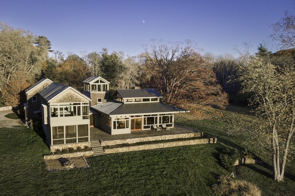 154 Argilla Road Ipswich, MA 01938 - Photo 39 of 42 a front view of a house with a yard