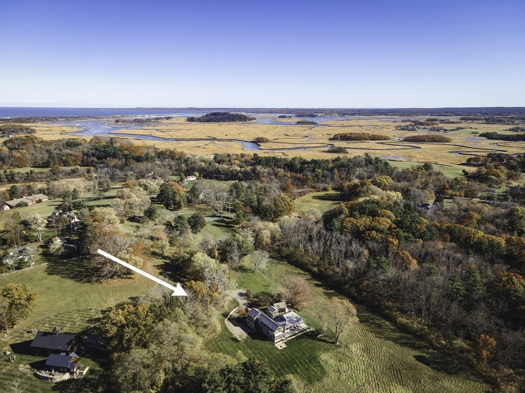 154 Argilla Road Ipswich, MA 01938 - Photo 4 of 42 a view of an ocean and beach