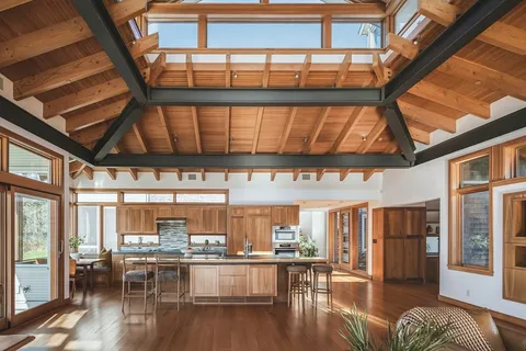 a kitchen with granite countertop lots of counter top space and dining table