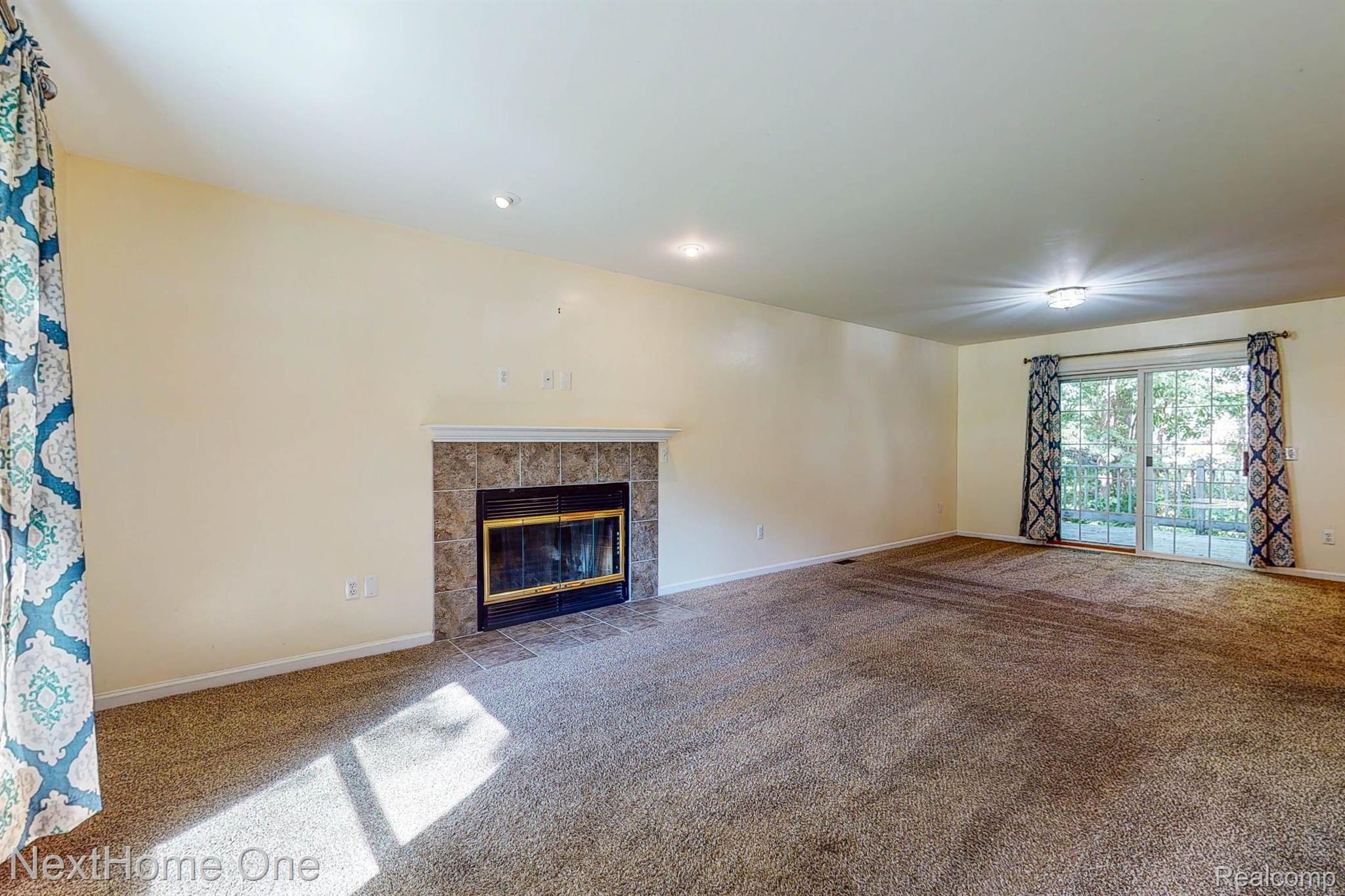4619 Culver Road Brighton, MI 48114 - Photo 7 of 33 gas fireplace