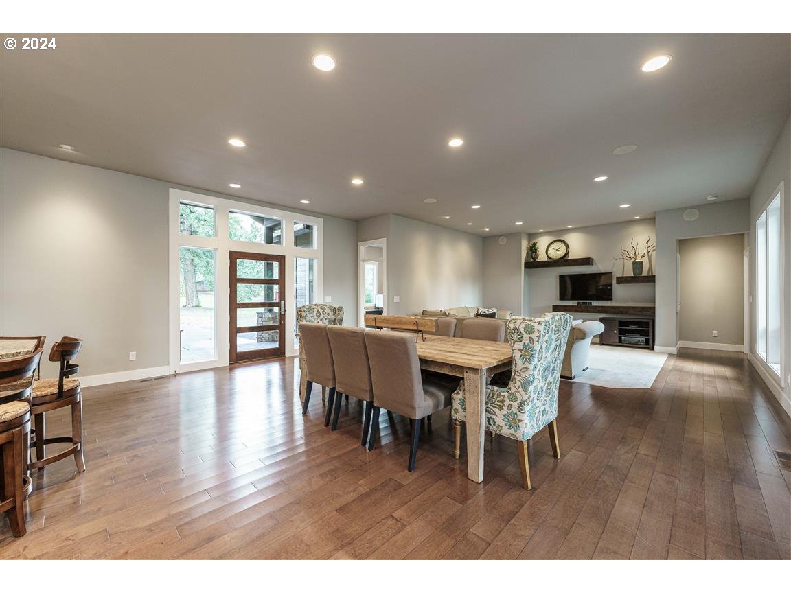 27015 Northeast Hathaway Road Camas, WA 98607 - Photo 16 of 48 a dining room with furniture and wooden floor
