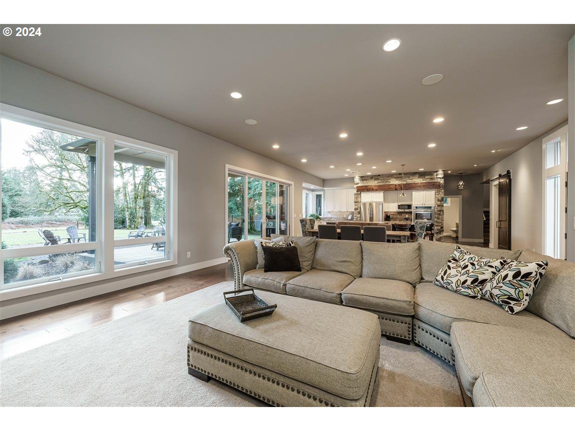 27015 Northeast Hathaway Road Camas, WA 98607 - Photo 19 of 48 a living room with furniture and a large window