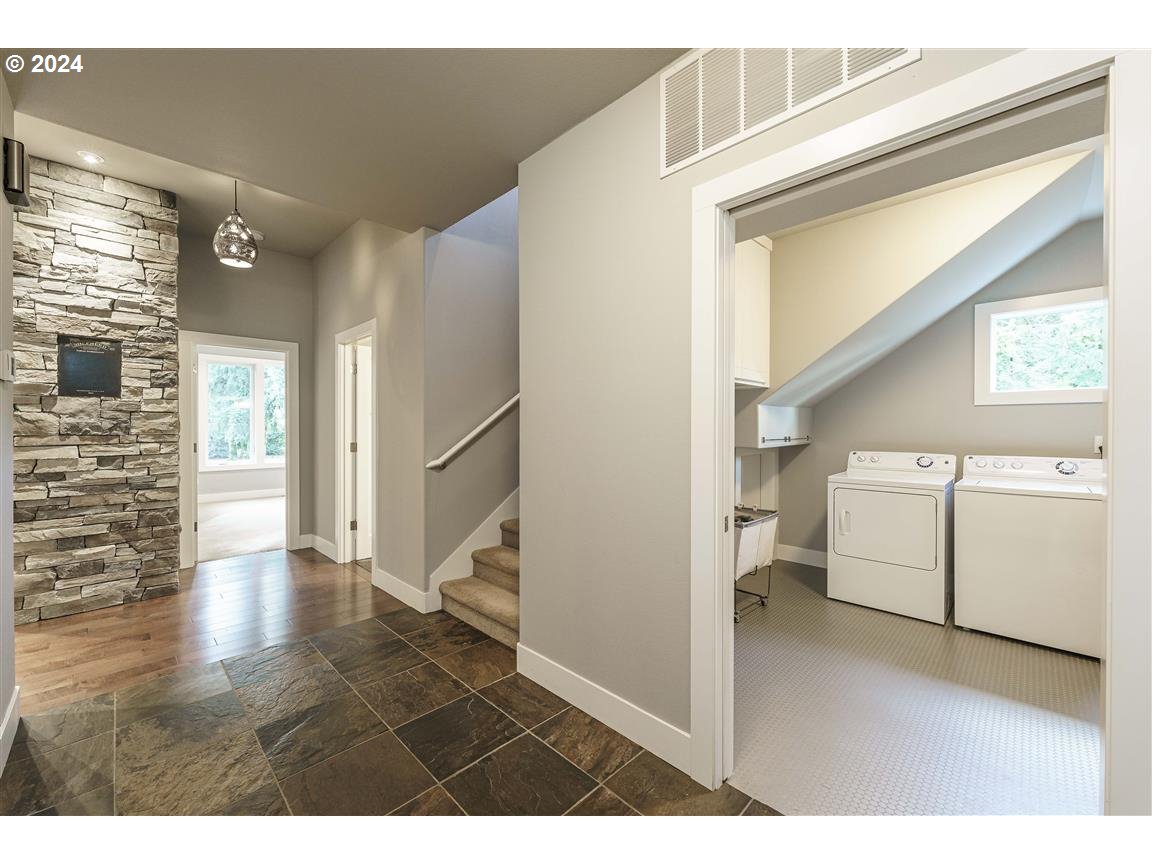 27015 Northeast Hathaway Road Camas, WA 98607 - Photo 28 of 48 a view of a hallway with washer and dryer