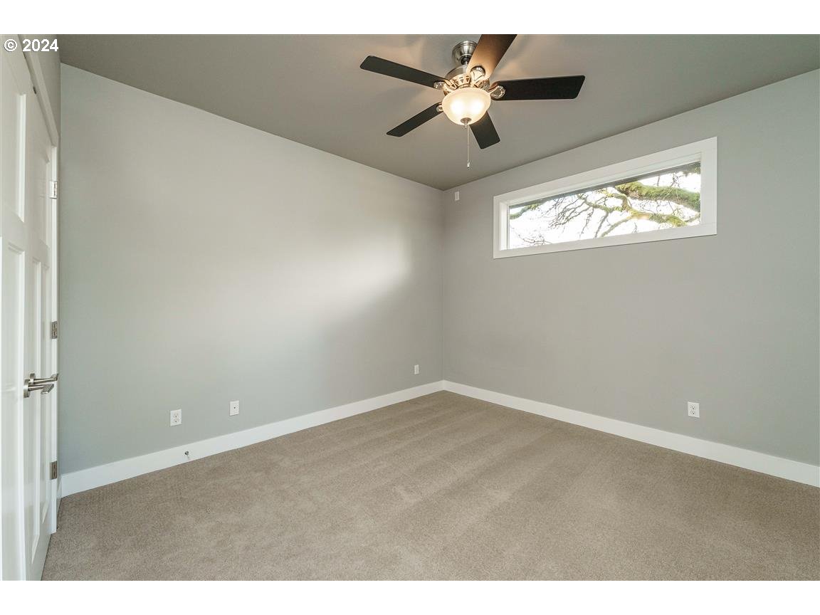 27015 Northeast Hathaway Road Camas, WA 98607 - Photo 36 of 48 a view of an empty room with a window