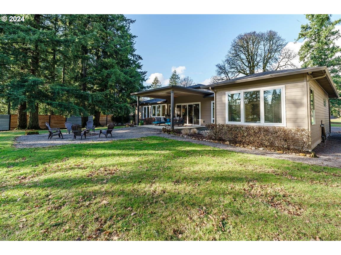 27015 Northeast Hathaway Road Camas, WA 98607 - Photo 41 of 48 a front view of house with yard and green space