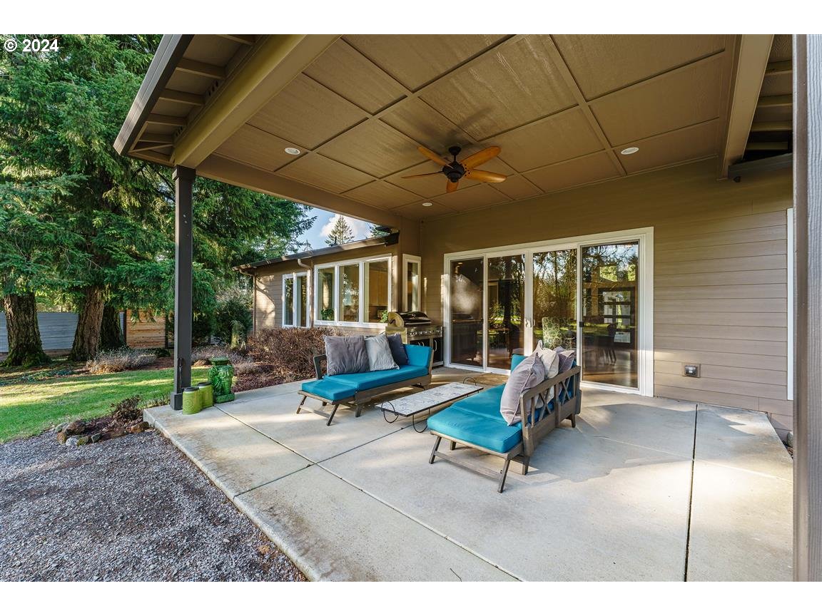 27015 Northeast Hathaway Road Camas, WA 98607 - Photo 44 of 48 a living room with patio furniture and garden