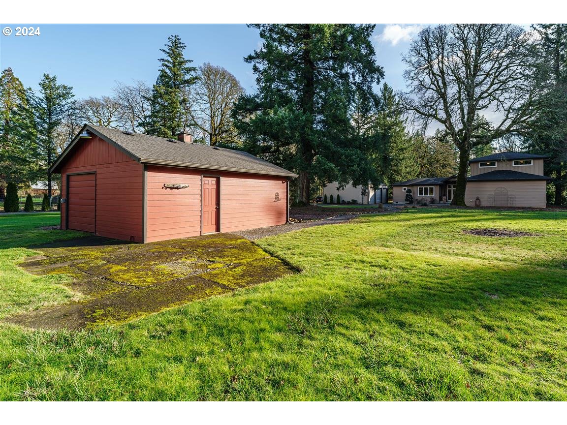 27015 Northeast Hathaway Road Camas, WA 98607 - Photo 46 of 48 a view of a backyard with large trees