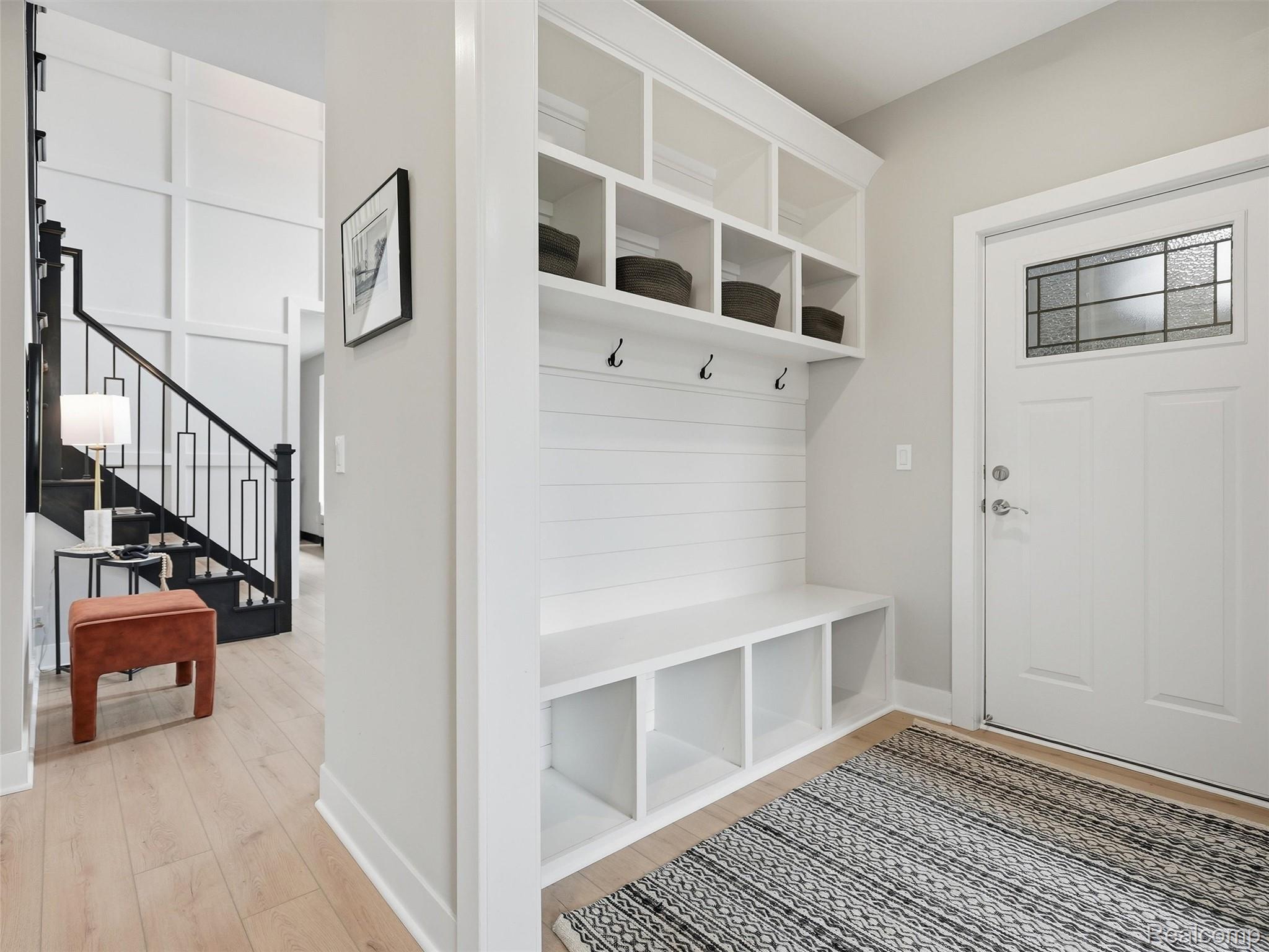 3007 28 Mile Road Washington, MI 48094 - Photo 21 of 69 Entryway featuring a built-in mudroom bench with integrated storage and upper cubbies