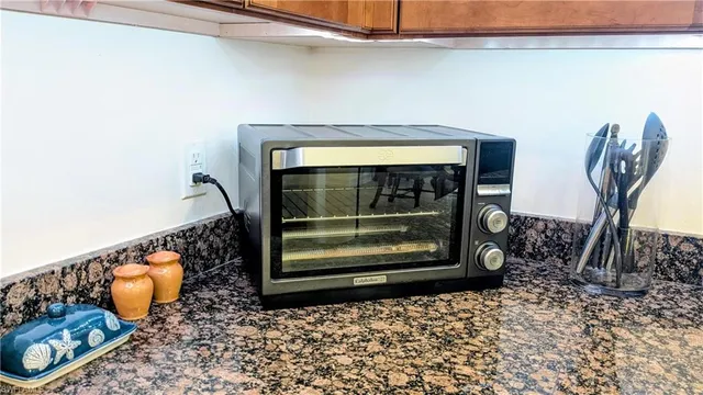 a view of fireplace and wooden floor