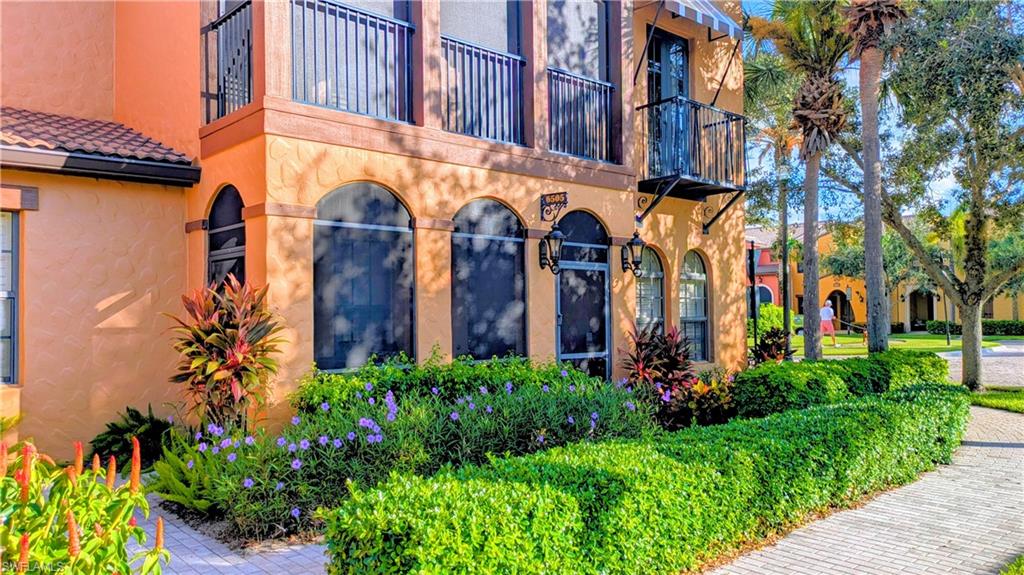 9081 Albion Lane South, Unit 6505 Naples, FL 34113 - Photo 3 of 41 front view of a building