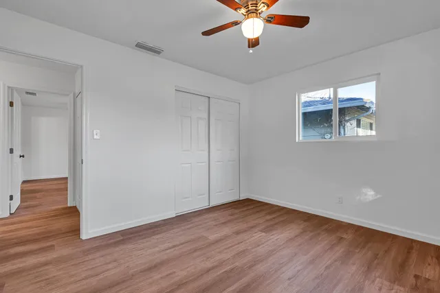 a bathroom with a sink toilet and a mirror