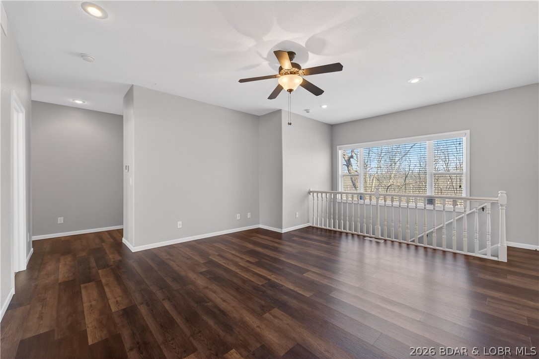 109 Reddington Road Four Seasons, MO 65049 - Photo 11 of 71 A spacious, open-concept living area flooded with