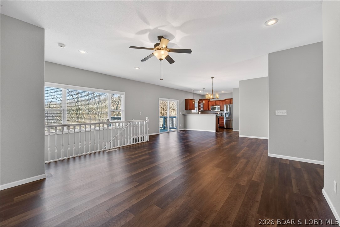 109 Reddington Road Four Seasons, MO 65049 - Photo 12 of 71 A spacious, open-concept living area flooded with