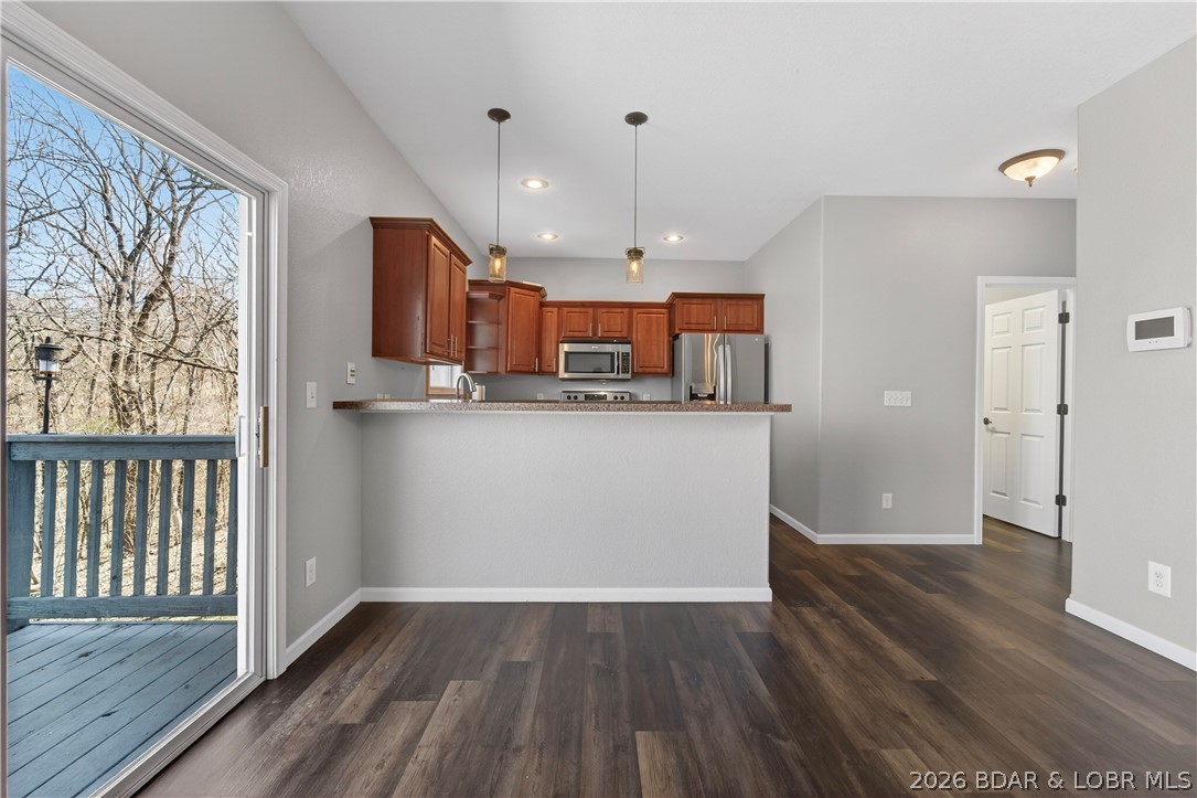 109 Reddington Road Four Seasons, MO 65049 - Photo 13 of 71 A spacious, open-concept living area flooded with