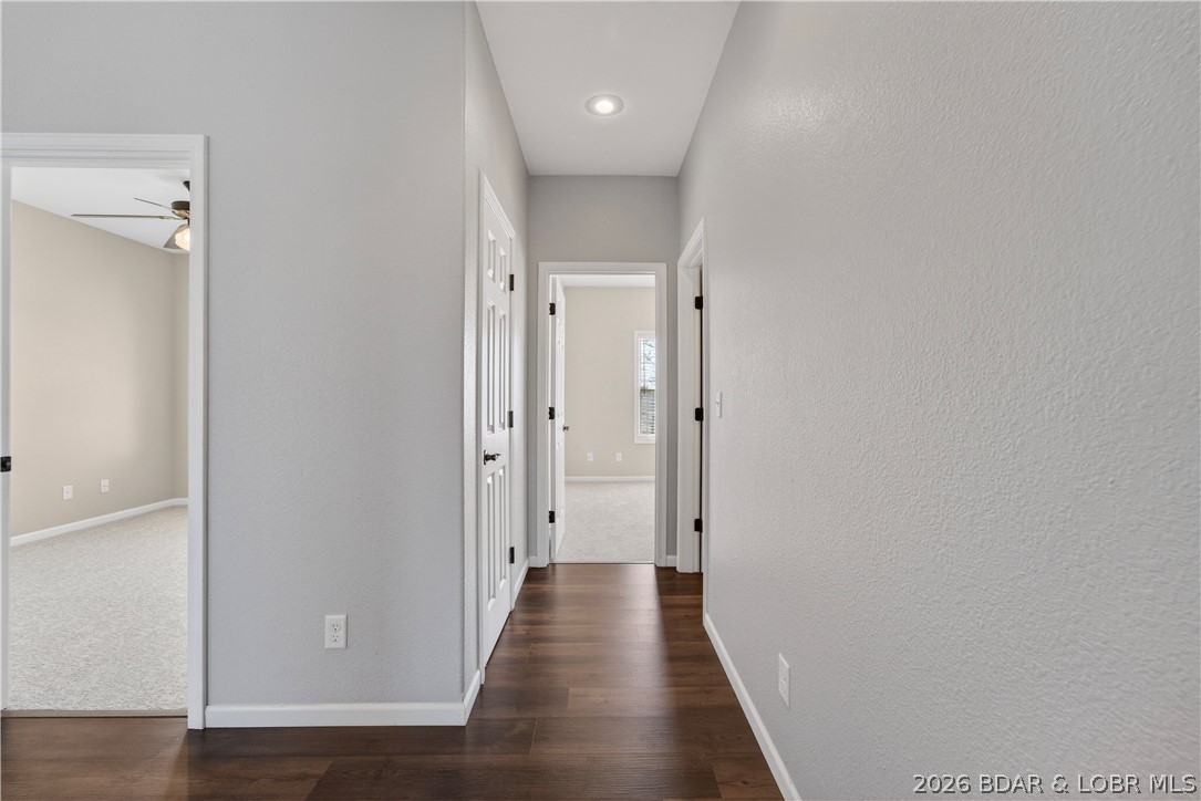 109 Reddington Road Four Seasons, MO 65049 - Photo 18 of 71 Hallway leading to the upper-level bedrooms.